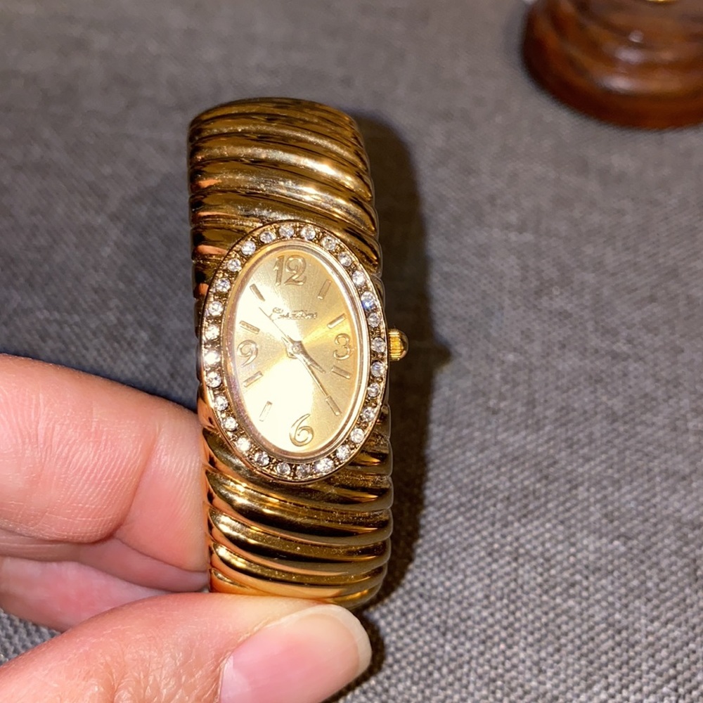 gold watch with gems around face - Picture 6 of 6